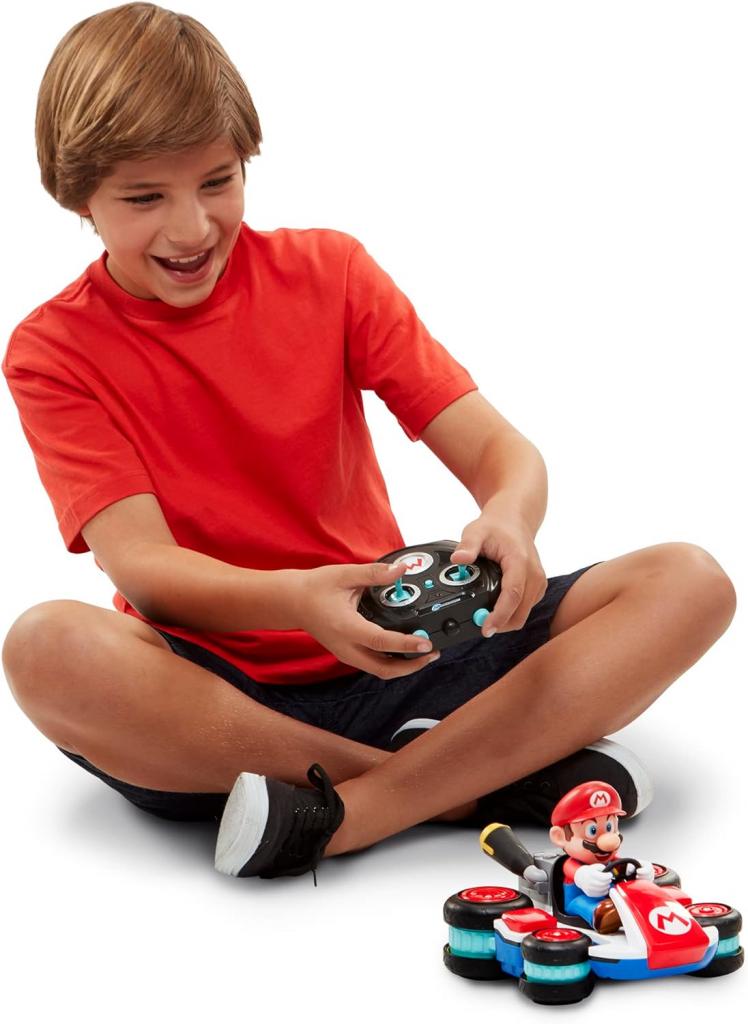 a kid playing with mario rc